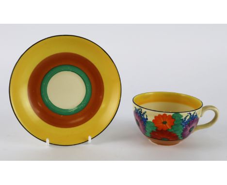 Clarice Cliff 'Gay Day' pattern tea cup and saucer, makers marks to base of each, saucer diameter 14cm approx.