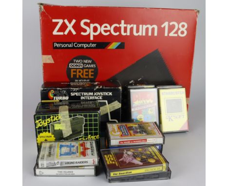 ZX Spectrum 128 personal computer / console, contained in original box, together with a collection of cassette games and acce