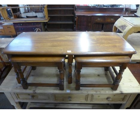 An Ercol ash nest of tables