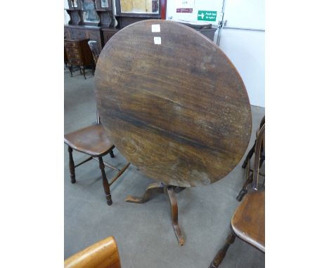 A Victorian mahogany tilt top circular tripod table