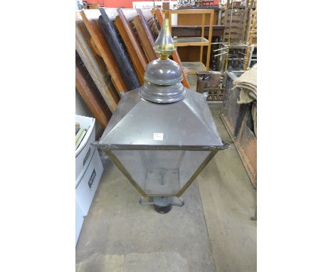 A brass and perspex hanging lantern light