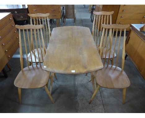 An Ercol Golden Dawn elm drop-leaf table and four chairs