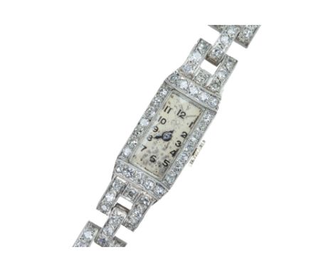 A ladyâ€™s French Art Deco diamond and platinum cocktail watch. The rectangular case inscribed with reference number â€˜19795