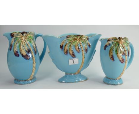A collection of Beswick light blue Palm vases: and Jugs (3) 