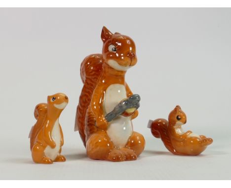 Beswick comical squirrel family: comprising Squirrel with nutcracker 1009, seated 1007and lying 1008. (3) 