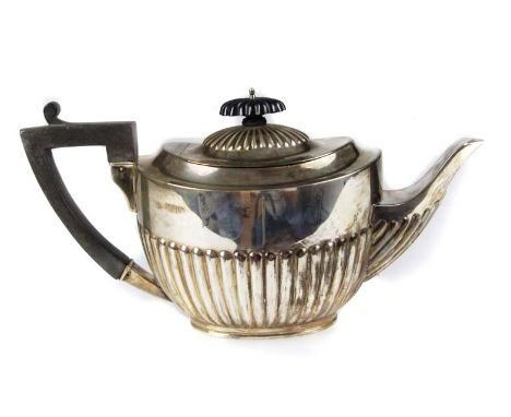 An Edwardian coffee pot, oval with half gadrooning, London 1902, maker's mark of William Hutton &amp; Sons, 500grs total appr
