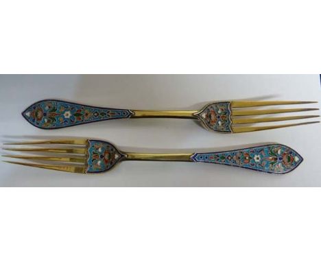 A pair of antique Russian cloisonné enamel and silver gilt forks, c1890, makers mark E.H 84 zolotniks mark, each fork finely 
