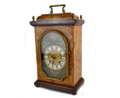 An Italian walnut veneered mantle clock, overpainted with foliate decoration, eight day movement, and striking on a bell