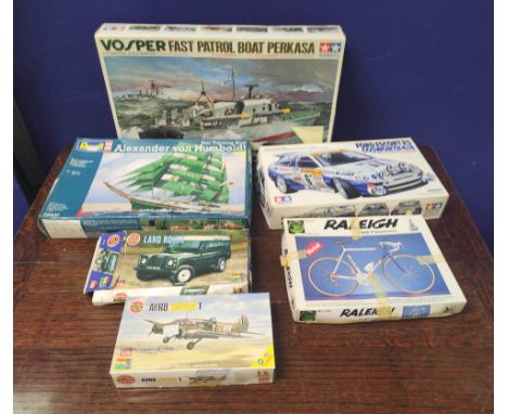 Group of kit models to include an Airfix 1:43 scale Land Rover 01411, Airfix 1:72 Avro Anson 1 02009, Tamiya 1:72 scale Vospe