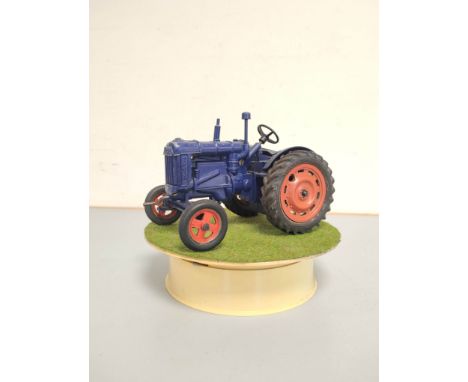 Vintage die-cast Chad Valley Fordson Major Tractor no 9235 with turntable display stand. 