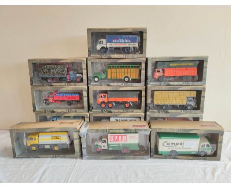 Twelve boxed 1.43 scale Spanish IXO model vehicles to include Comet Maria Fernanda truck, Pegaso Z206, among others. (12) 