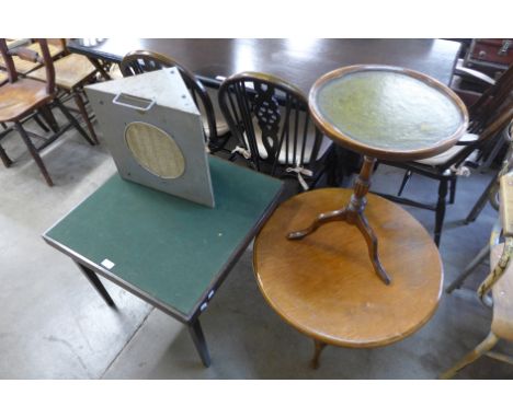 A circular work table, a folding table, an occasional table and an Elpico speaker