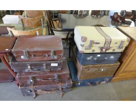 Eight vintage suitcases