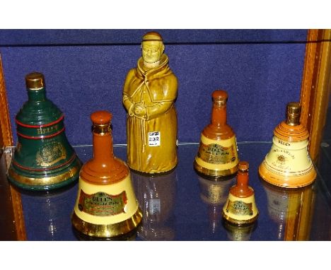 Five Wade Bell's whisky decanters, empty, also with an Abbots choice whisky decanter by John McEwan & Co ltd, Leith (6)