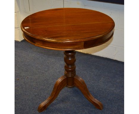 A reproduction tripod table, with circular top, 80cm high x 184cm wide