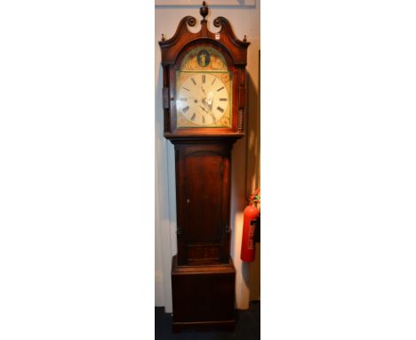 A late 18th century oak longcase clock, the hood with broken swan pediment and urn finial to the centre above glazed door enc