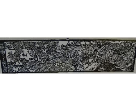A modern Chinese papercut, depicting figures in village landscape, character marks to left hand side, glazed and framed, 37 x