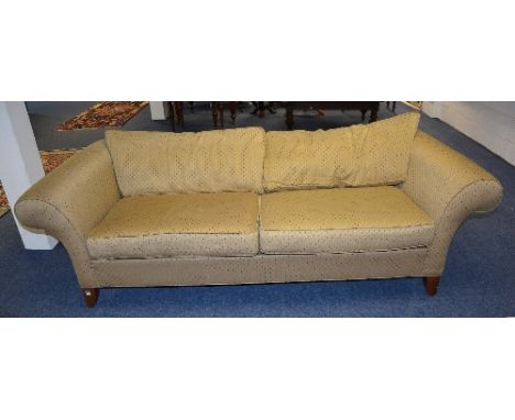 An upholstered two seater sofa by Ethan Allen, upholstered in gold coloured fabric, 70cm high x 240cm wide