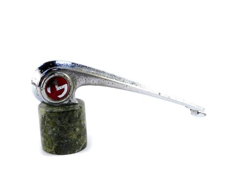 A vintage early 20thC chrome car mascot, of flame form, set with a roundel bearing a letter M or W (possibly Morris Minor ?) 