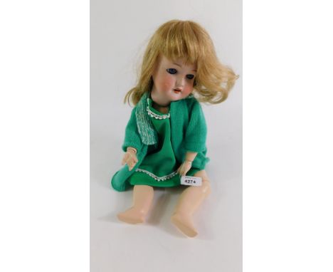A Bergmann Walterschausen bisque head doll, 1916/3, 44cm high.