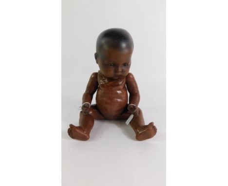 An Armand Marseille black bisque head doll, no 341/4K, 36cm high.