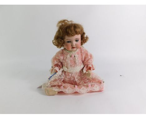 A Mengereuth bisque head doll, c1920, with sleeping eyes, PM924, 44cm high.