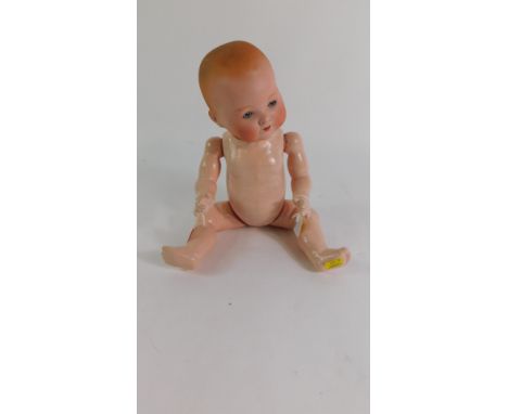 An Armand Marseille bisque head Dream Baby doll, no 351/3 1/2, 37cm high.