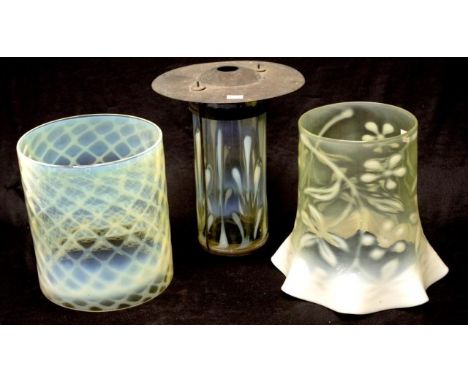 Three various vintage vaseline glass lamp shades each with patterned decoration, 1 with brass frame, (height 20cm approx, ave