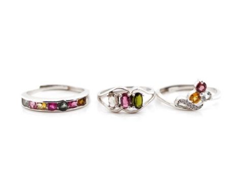 Three multi colour tourmaline and silver rings approx size K-O adjustable
