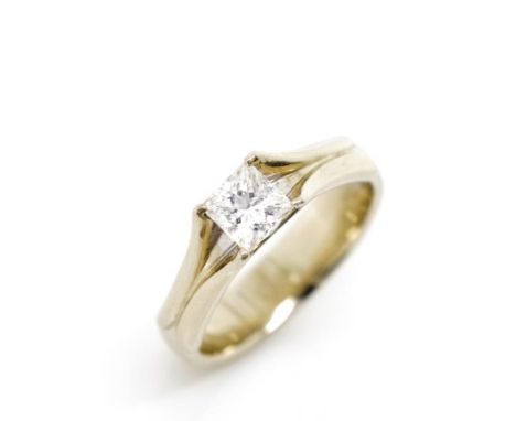 Solitaire diamond set 18ct white gold ring marked 750. Approx  princess cut diamond size 0.57ct, colour F, Clarity Si1. Also 
