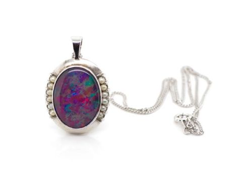 Vintage opal triplet and 9ct white gold pendant, marked 9ct to back plate and bail. Approx weight 7.6 grams, pendant size 21x