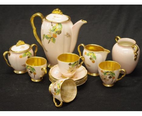 Good Carlton Ware part coffee set fruit and berry pattern on pink ground including 4 coffee cups with gilt interior, and sauc