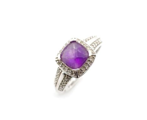 Amethyst, diamond and 9ct white gold halo ring marked 375 AC. Approx weight 3.5 grams, ring size P