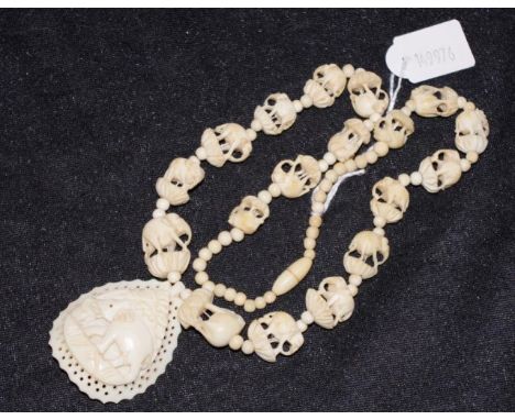 Early Indian ivory elephant necklace & pendant circa 1930, length 38cm approx.NB. This item cannot be exported.