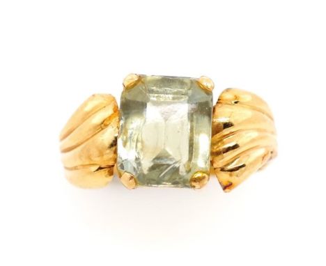 Yellow gold and green gemstone cocktail ring rubbed marks. Approx weight 3.4 grams, ring size Q. Tests as 18ct. test as quart