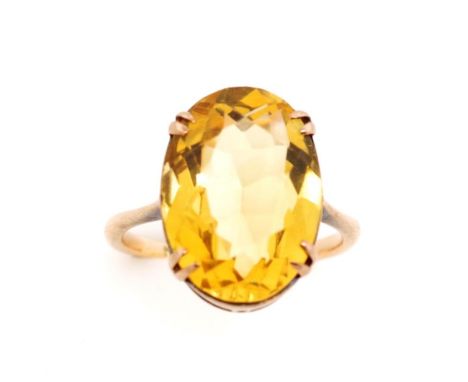 Mid century citrine and 9ct rose gold ring marked 9ct. Approx oval cut size 11mm x 16.5mm, ring size K, weight 3 grams