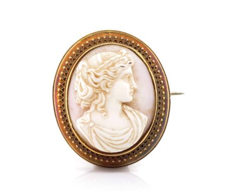 Victorian cameo gold locket brooch with well carved side portrait of a lady in the Hellenistic style likely in pink conch she