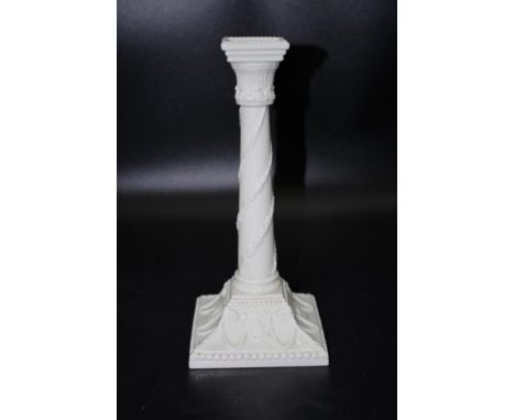 Royal Worcester candlestick white ceramic with embossed garland decoration, marked to base and # 1030, (height 27cm approx).