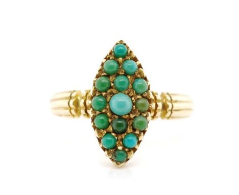 Victorian turquoise set 18ct yellow gold ring with a navette setting and fluted column shoulders. Marked 18ct Birmingham, dat