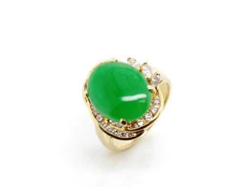 Jade and diamond set 18ct yellow gold dress ring marked 18k, approx 1x jade cabochon 15.3mm x 12.10mm, 23x channel set round 