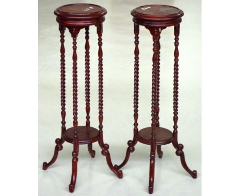 Two vintage wooden plant stands 100cm tall, by 29cm wide.