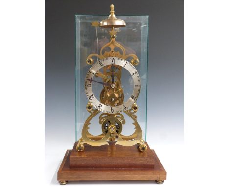 A hand built skeleton clock with single fusee movement and Roman chapter ring, the movement striking on a bell, with hand boo