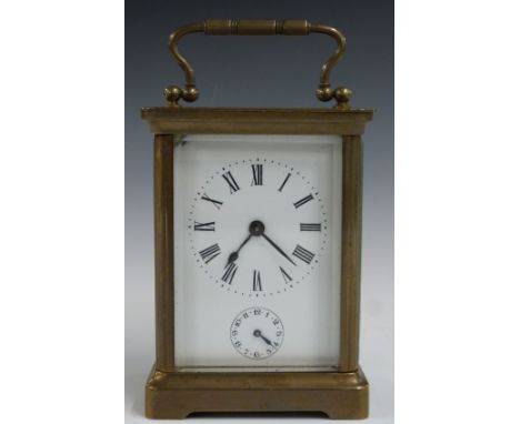 Brass carriage clock with alarm function, stamped ACG inside with Roman numerals to the enamelled dial, H10cm