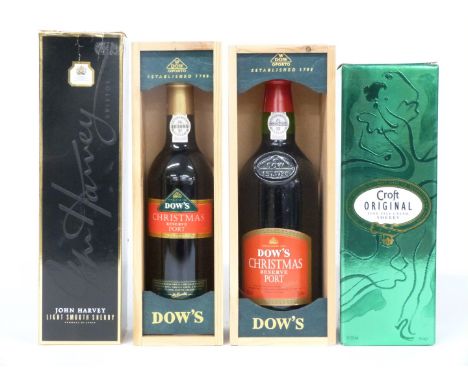 Two bottles of Dow's Christmas Reserve Port, one 50cl the other 75cl, both 20% vol in presentation cases, a bottle of John Ha