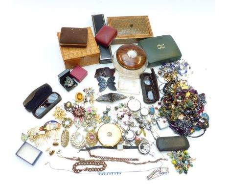 A collection of jewellery including pocket watch, three silver ingots, beads, vintage brooches, etc