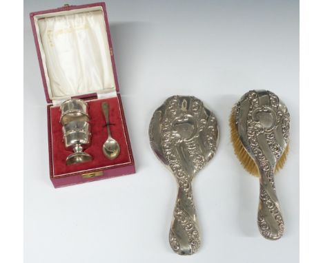 Cased hallmarked silver egg cup, napkin ring and spoon set, weight 110g, together with a hallmarked silver mounted hand mirro