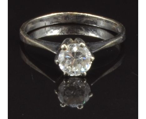 An 18ct white gold ring set with a round cut diamond of approximately 0.7ct, size Q, 2.9g