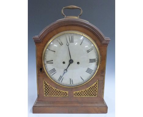 English Regency fusee mantel clock in arch topped flame mahogany case with gilt brass inset pierced decoration, the painted R