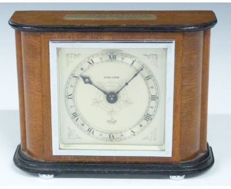 Elliot mantel clock with&nbsp;Kendal &amp; Dent to silvered engraved Roman dial, the wooden case with ebonised decoration, ra