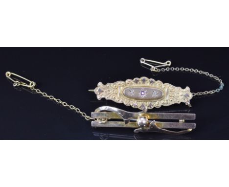 Victorian 9ct gold brooch set with a ruby and diamonds, verso a glass compartment and a 9ct rose gold brooch, Birmingham 1913